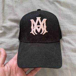 AMIRI
MA logo-embroidered trucker hat